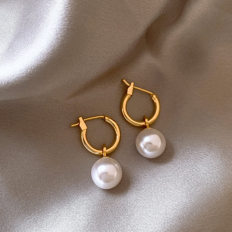 Boucles d'oreilles élégantes avec perles dorées